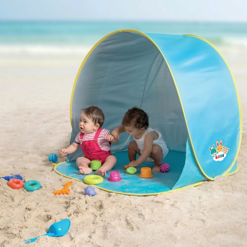 Tente de plage anti-UV de LUDI. Protège la famille du soleil, du vent et du sable (sac de transport inclus). Livré avec 4 piquets pour fixer l’aire de jeu dans le sable.