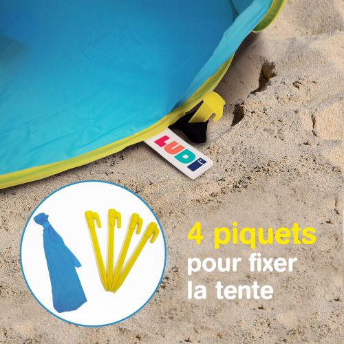 Tente pop-up anti-UV de LUDI. Protège la famille du soleil, du vent et du sable (sac de transport inclus). Livré avec 4 piquets pour fixer l’aire de jeu dans le sable.