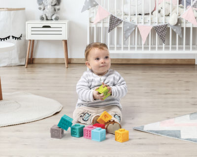 The Interlocking Blocks including 9 soft, colourful blocks to stack and interlock. Specially designed with crashes and nibbling in mind. Guaranteed safety and hygiene