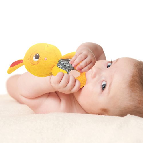 Soft fabric rattle with a harmonious little bell. Stimulates your baby's grasp reflex. Develops dexterity. Hygienic.