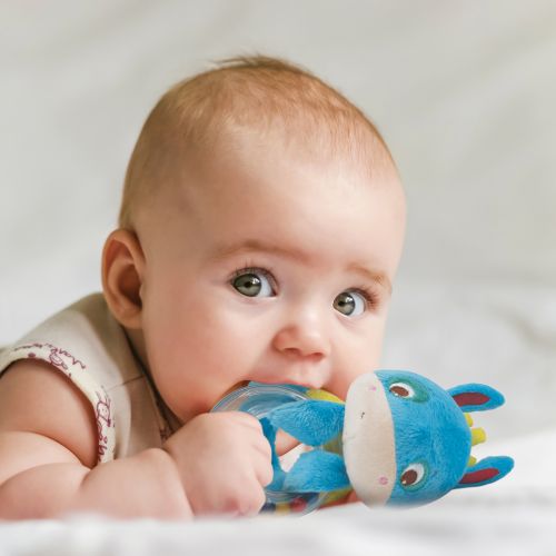 Soft fabric rattle with a harmonious little bell and a teething ring. Stimulates your baby's grasp reflex. Develops dexterity. Hygienic.