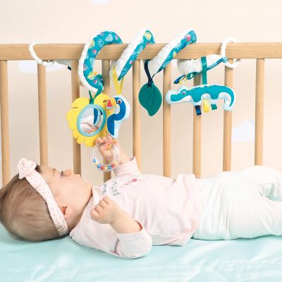 Spirale « croco » de LUDI. Spirale de jouets d'éveil qui s'accroche à de multiples supports. Composée de nombreuses activités (anneau de dentition, miroir, pouêt pouêt). Pour les enfants dès la naissance. Référence produit 30082.
