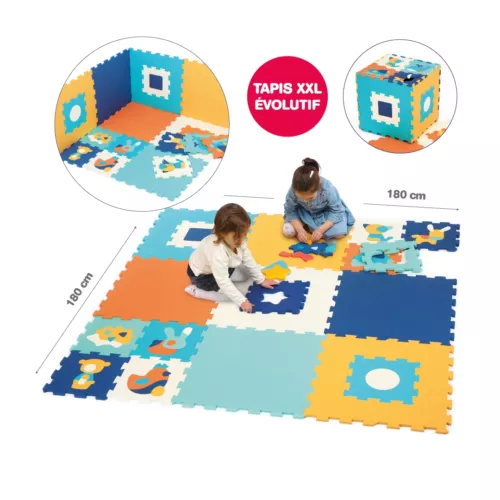 Tapis Mousse Jumbo de LUDI. Une grande surface de 180 x 180 cm, confortable pour jouer en sécurité ! Le tapis isole l’enfant du froid et amortit les chocs. Puzzle ludique : 2D, 3D ou jeu d’encastrement avec les petites dalles, les formes géométriques et les animaux. Hygiénique, utilisation indoor. Pour les enfants de plus de 10 mois. Référence produit 10014.