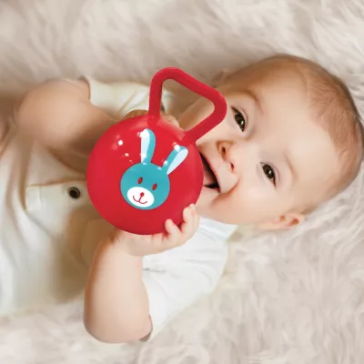 Ball rattle assortment from LUDI. Soft plastic rattles with a harmonious little bell, designed for easy handling. Develops baby's dexterity. Hygienic. For children from 3 months. Product reference 30012.