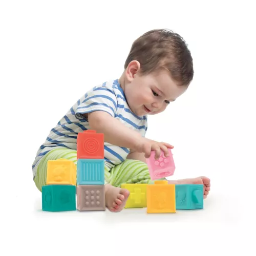 LUDI interlocking cubes. 1st construction game! 9 soft, colourful cubes to stack and fit together. Specially designed for crushing and chewing. Safety and hygiene guaranteed. For children from 10 months. Product reference 30043.