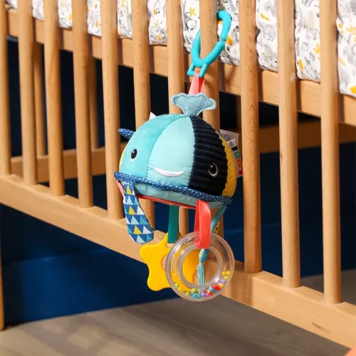 There's lots to do on this whale-shaped hanging activity toy, which stimulates baby's senses, fine motor skills and grasping ability, while letting him have fun learning to use his hands! From 3 months.