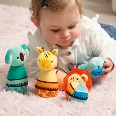 Baby's first bowling game. 4 weighted animal pins to knock over with the ball. Soft materials for playing and cuddling. From 10 months.