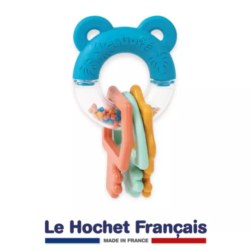 Multi-textured teething rattle. Different sensory stimuli. 3 textured keys for a secure grip. Made in France. From birth.