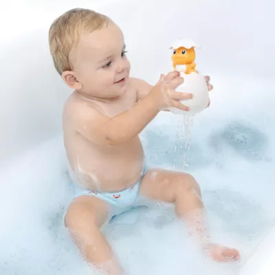 LUDI magic egg. An original and fun bath game! Dip the dino in the water and its head will pop out of the egg. Easy to catch, baby will enjoy watching the rain fall. For children over 10 months. Product reference 40060.