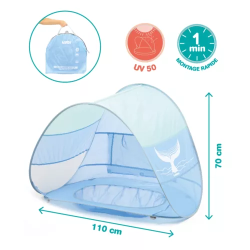 Piscine pop-up à partir de 10 mois. Recouverte d'une tente anti-UV pour le protéger du soleil, du vent et du sable (sac de transport + 4 fixations au sol inclus). Dès 10 mois.