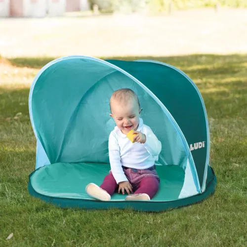 Petite tente anti-UV qui protège du vent et des rayons du soleil. Ajoutez un peu d'eau, Bébé pourra patauger et se rafraîchir. Dès la naissance.